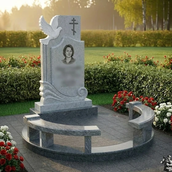 Гранитный памятник с голубкой, крестом и волнами, гранит Мансуровский