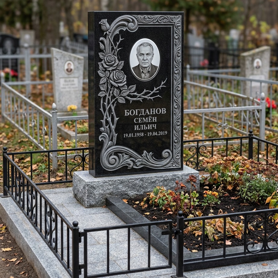 Пример дизайна: Памятник с ветвью и резьбой из чёрного гранита — фото и цена