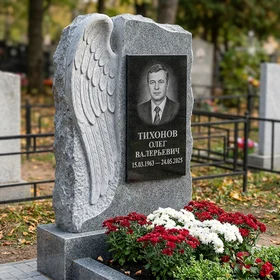 Мемориал с крылом ангела из серого гранита