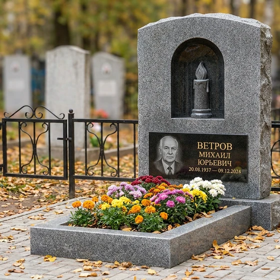 Памятник с горящей свечой из мансуровского гранита с портретом