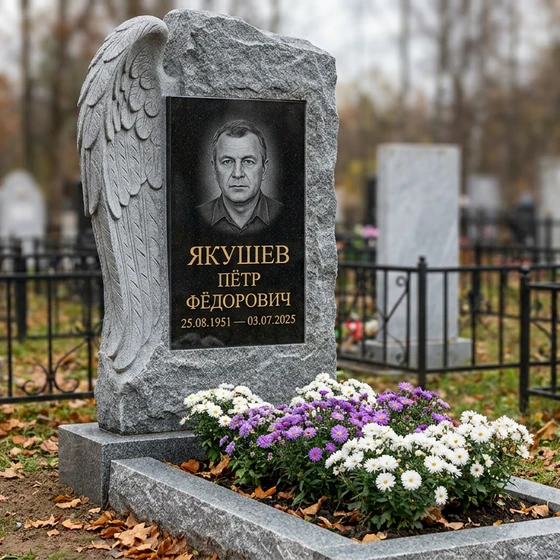 Памятник с ангельским крылом из мансуровского гранита