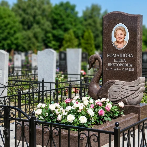 Памятник с лебедем из дымовского гранита с фотокерамикой